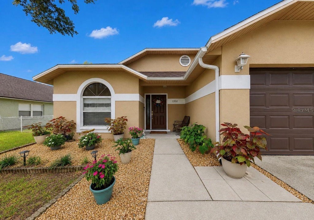 Photo of 1302 Brahma Drive, Valrico, FL 33594 (MLS # TB8539021)