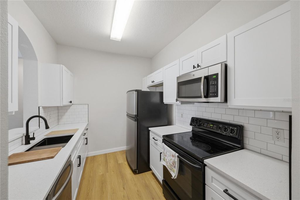 Photo of 3190 Dante Drive #305, Orlando, FL 32835 (MLS # O6393715)