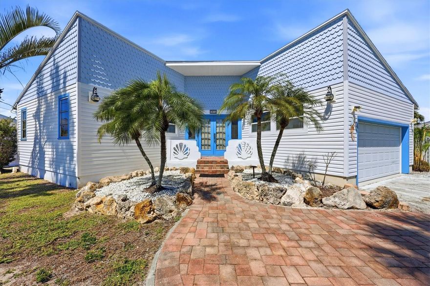 This adorable and unique two bedroom, two bathroom home is TURNKEY furnished and move-in ready!Lush, mature, landscaping frames the home's entry and tastefully accents the entire property. Upon entry, you will have convenient access to the private primary bedroom suite, featuring a large walk-in closet with built-in shelving, or you can continue into the home to see the open concept living and dining space. Connected you will find the kitchen, featuring stainless steel appliances and illuminated by ample lighting. The split floorplan provides distance between bedrooms and the second bathroom also connects to the bedroom for your guest's convenience and privacy. Multiple trees shade the spacious backyard, paved patio and the wood dock. With only the Placida Road bridge to pass under, this property is an ideal location for the avid boater who enjoys the idea of hopping onto their boat and quickly driving out to Lemon Bay and the intercoastal. With a quaint, Old Florida feel this home can fit any lifestyle and is perfect for both full or part-time residents, or as a charming vacation rental. Close to gulf beaches, world-class fishing, shopping, dining and multiple golf courses this home is ideally located for any homeowner! Call today for your private showing!