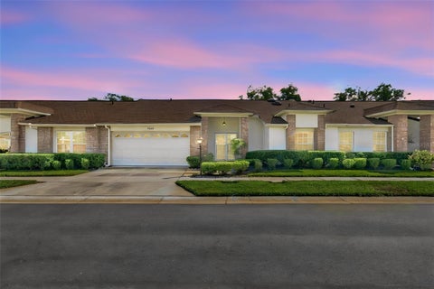 Photo of 9052 Arundle Place, New Port Richey, FL 34655 (MLS # W7889610)