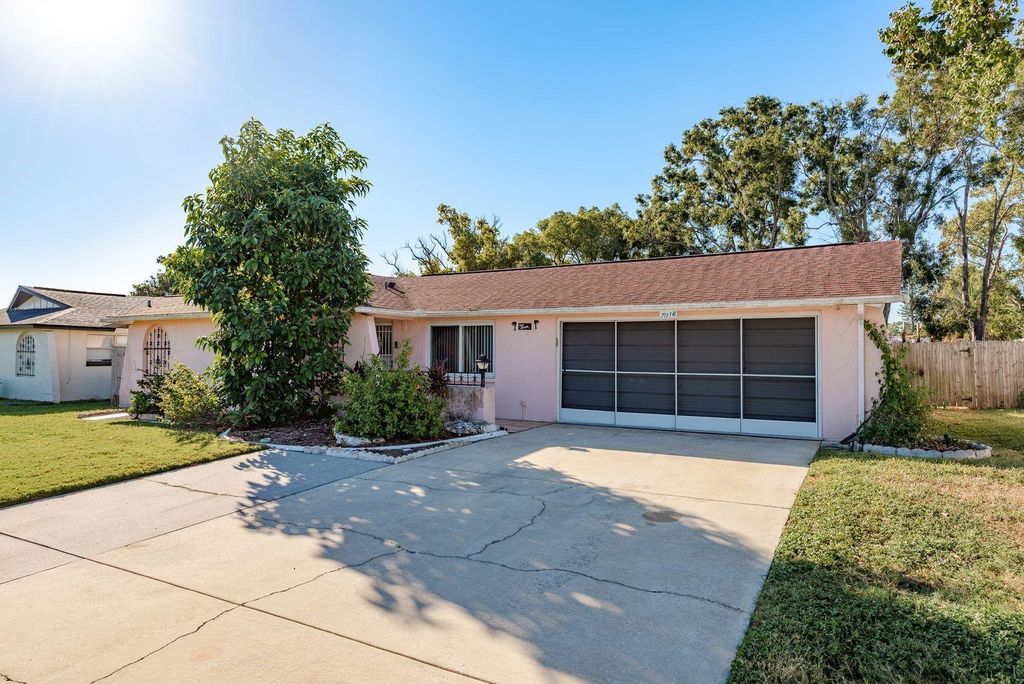 Photo of 7216 Embassy Boulevard, Port Richey, FL 34668 (MLS # TB8437565)