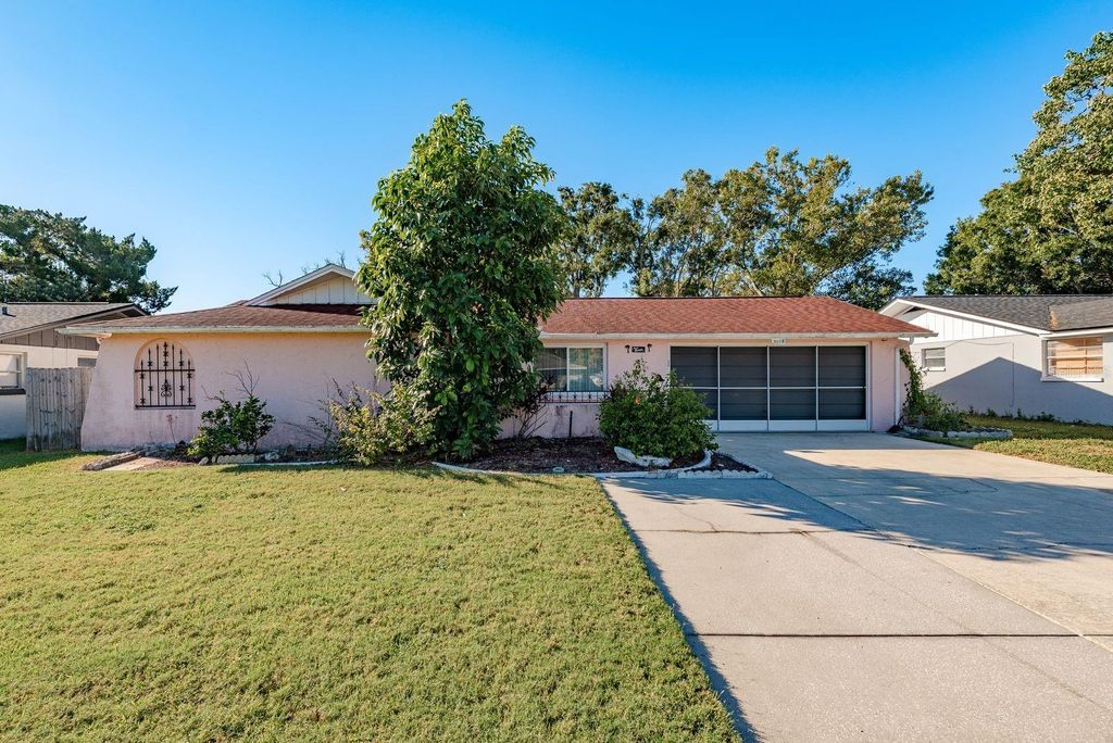Photo of 7216 Embassy Boulevard, Port Richey, FL 34668 (MLS # TB8437565)