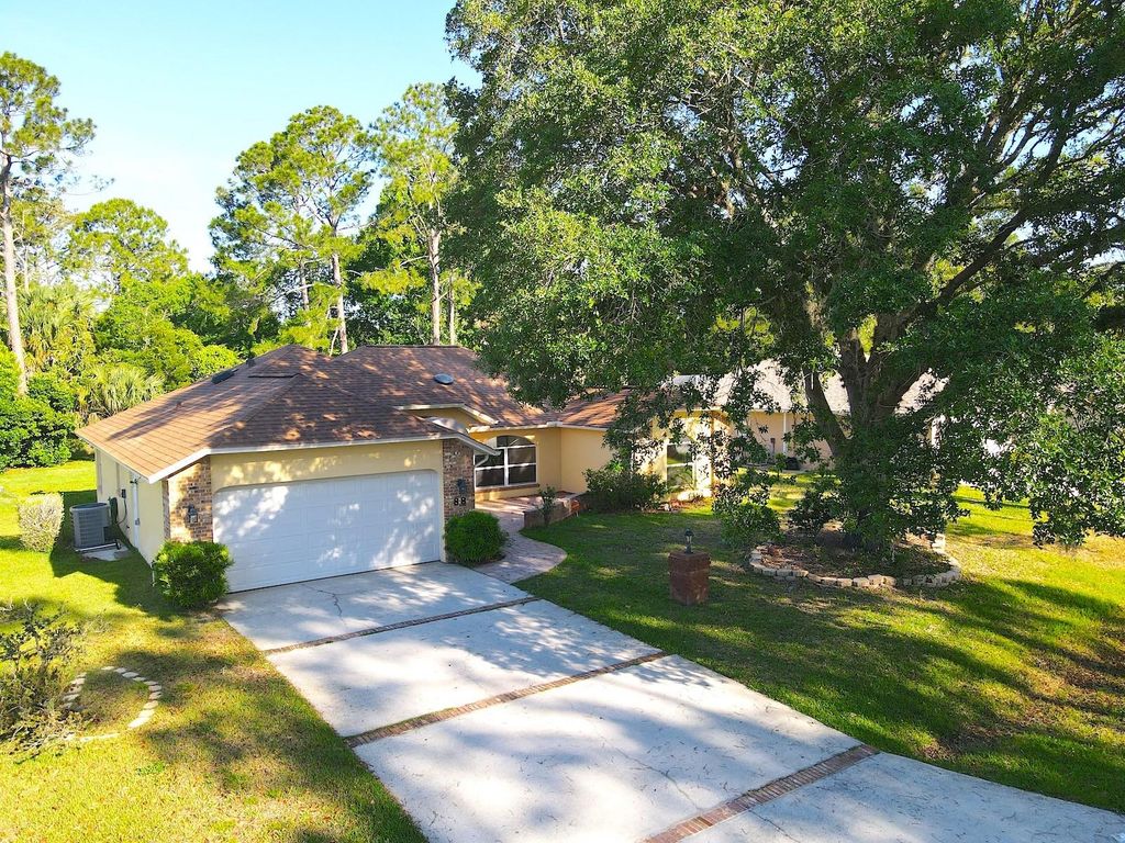Photo of 88 Wynnfield Drive, Palm Coast, FL 32164 (MLS # FC318288)