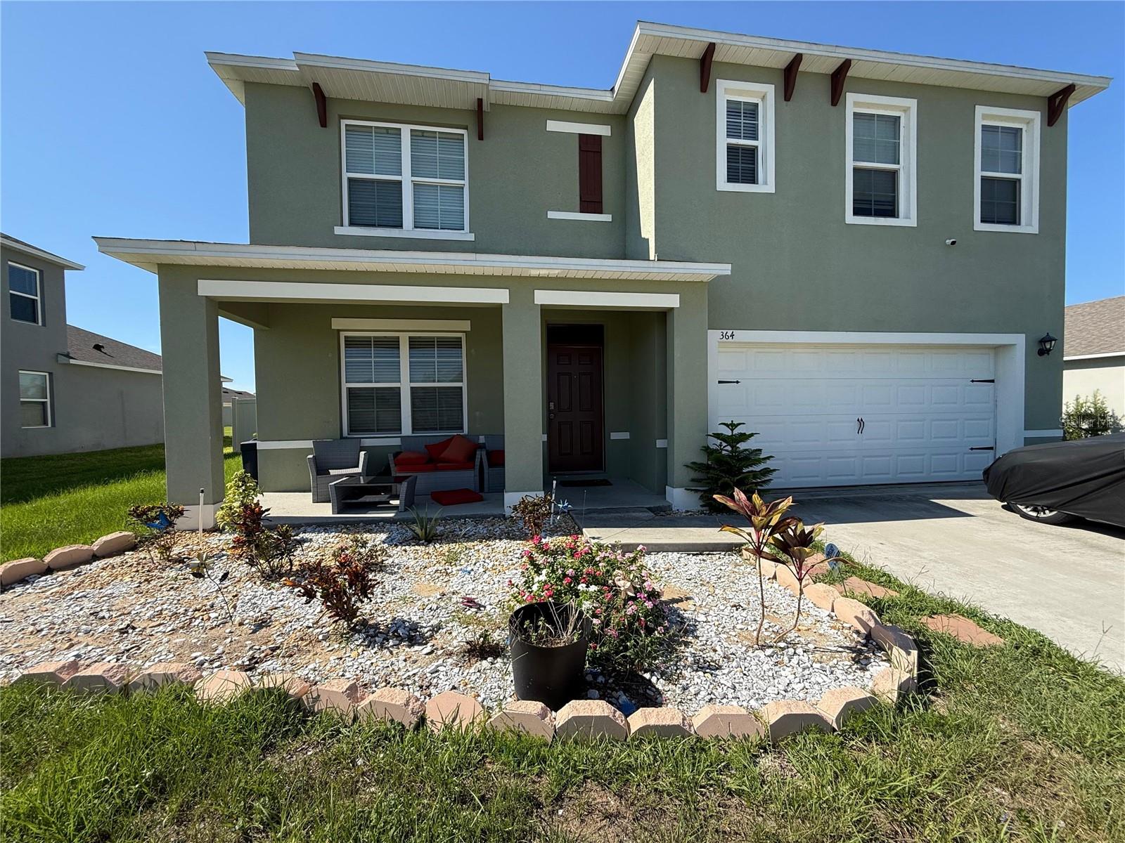 Beautiful home!!! Come see this spacious 6 bedroom, 3 bath home with upgraded countertops, tile throughout, a flex room by the foyer, and 5 Bedrooms on the second floor and another one in the first floor given you plenty of room under one roof. This home also has an owners suite with his and hers walk in closets. The house is built with block over block construction and is also wired to be a smart home. The home features a beautiful open kitchen with stainless steel appliances and an island great for entertainment. The back yard is fenced and is ideal for your privacy and security and also great use if you have pets. The home is also located near grocery stores and is just minutes away from I4, restaurants, schools, Disney and much more. Enjoy in the beautiful community pool.