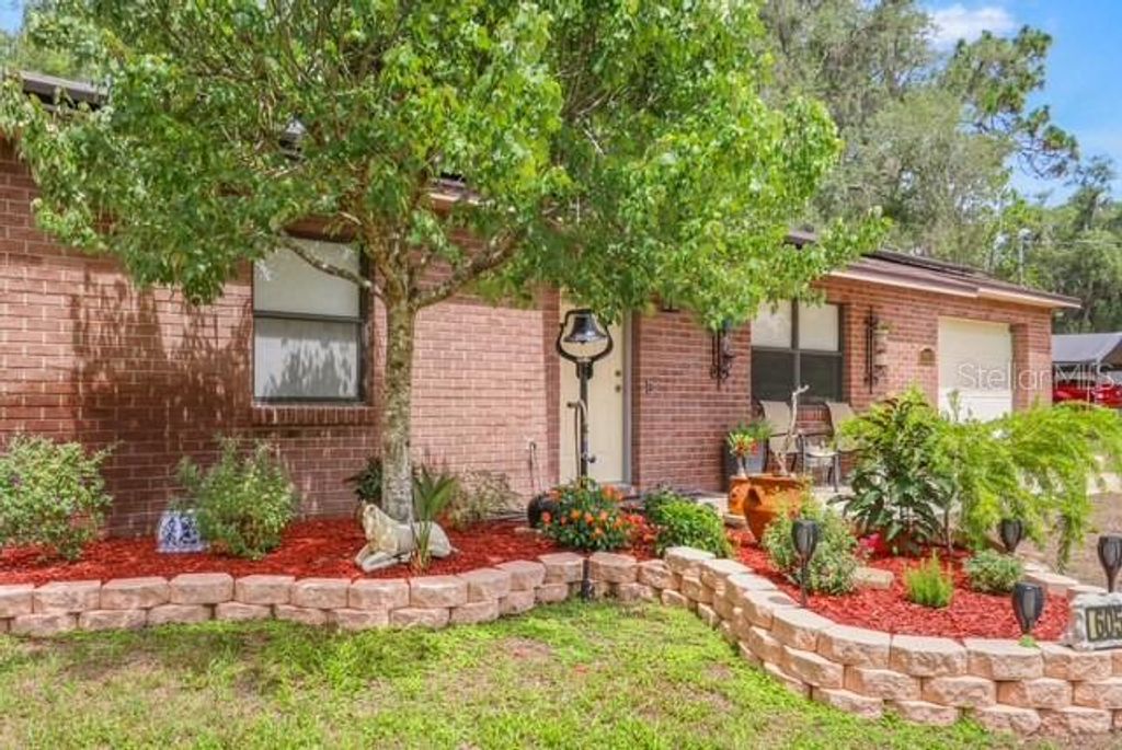 Photo of 6057 Knollwood Drive, Dade City, FL 33523 (MLS # OM726832)