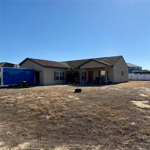 Photo of 1100 Nelson Meadow Lane, Kissimmee, FL 34759 (MLS # O6380465)