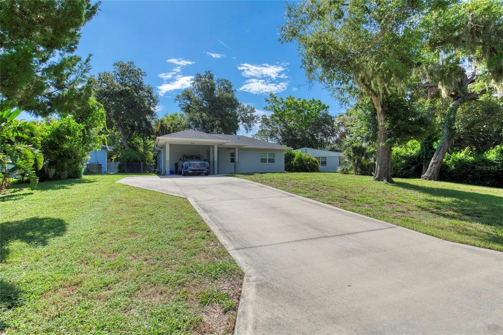Photo of 615 S Ridgewood Avenue, Ormond Beach, FL 32174 (MLS # V4950011)