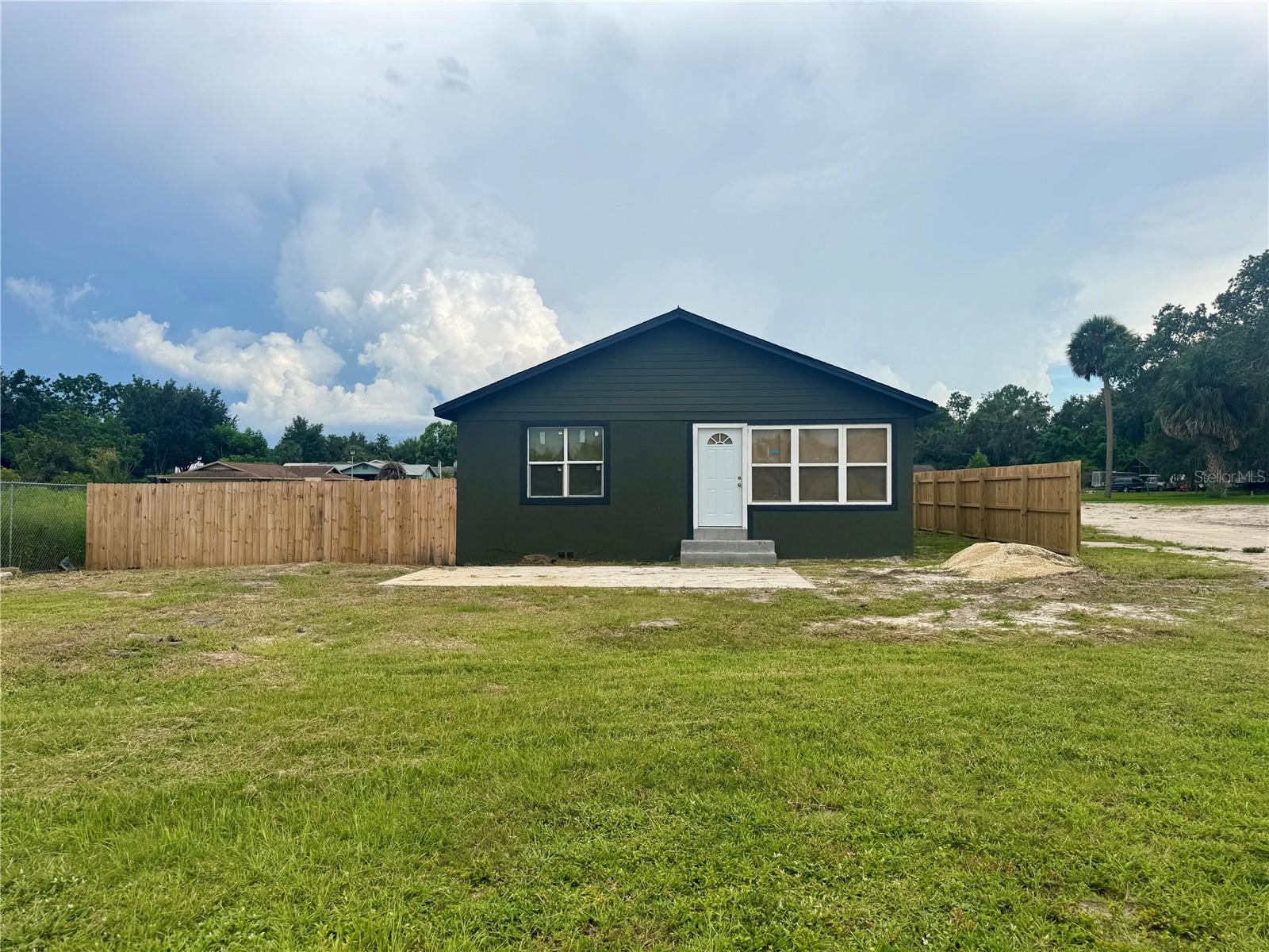 Under Construction. HUGE PRICE ADJUSTMENT!! HUGE PRICE ADJUSTMENT!! MAKE YOUR OFFICE THE WAY, YOU WANT IT!! PRIME COMMERCIAL LOCATION!!!! Now is your chance to own a SEMI renovated 1,242 sq. ft. commercial building in a prime location right off Highway 441, with additional access from Old Tavares Road. Situated on a .27-acre lot in a high-traffic area, this property offers excellent visibility, ample parking, and unbeatable accessibility—perfect for professional offices, medical practices, or small businesses. Currently under construction, the building will feature tile floors, four private offices, two restrooms, a welcoming lobby, and a functional break room. All plumbing and electrical work has been completed, and a brand-new AC unit TO BE installed. Act now and take advantage of the opportunity to choose your own wall colors and finishing touches, giving your new business space a personalized feel. (BUYER/OWNER TO COMPLETE THE REST OF REMODEL FOR THEMSELVES).