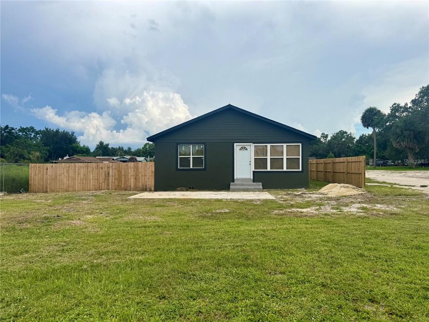 Under Construction. ANOTHER HUGE PRICE ADJUSTMENT! YOU CAN MAKE THIS ONE JUST THE WAY YOU WANT IT!! This versatile 1,242 sq. ft. commercial building on a .27-acre lot offers a rare opportunity to create your ideal business space in a prime location just off Highway 441, with additional access from Old Tavares Road. Perfect for a range of uses including professional offices, medical practices, AC retail, contractor storage yard, warehouse, or other multi-use businesses. The interior layout includes four private offices, two restrooms, a welcoming lobby, and a break room. Plumbing and electrical have already been completed, and the space is ready for you to bring your vision to life. With ample parking, excellent visibility, and flexible potential, this property is ready for you to make it your own and customize it to suit your unique needs.