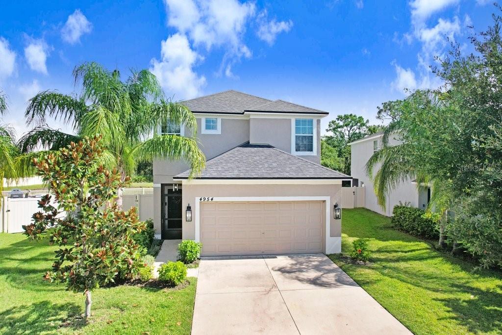 Welcome to this beautifully updated home in the sought-after, family-friendly community of Vista Palms. Offering a perfect blend of comfort, style, and convenience. With thoughtful upgrades throughout and no rear neighbors, this home is truly move-in ready.
Step inside to find a new roof (June 2025), new carpet (April 2025), and luxury vinyl plank flooring (July 2022), complemented by fresh interior and exterior paint (July 2025). The spacious screened front porch and back lanai, back patio equipped with ceiling fan, inviting you to relax and enjoy the serene pond views.
The first floor features tile throughout, a full bathroom and bedroom, and a bright, open-concept living space. The heart of the home is the kitchen, featuring wood cabinetry, a stunning stone-wrapped island, luxury tile backsplash, stainless steel appliances (stove replaced June 2025, fridge/microwave/dishwasher 2021), and an oversized walk-in pantry. A built-in desk offers a perfect workspace, and the dining area flows seamlessly into the sun-filled great room.
Upstairs, a large open loft provides flexible space for a home office, playroom, or media area. The king-sized master suite includes a generous walk-in closet and a spa-inspired bathroom with dual sinks, garden tub, separate shower, and private water closet. Two additional bedrooms and an upstairs laundry room complete the second floor.
Additional features include:
Freshly painted garage floor
New toilets (2022)
Fully fenced yard (2023) with dual gate access
Hurricane shutters
Ceiling fans in every room
Window alarm system and exterior cameras for added security
Curtain rods and drapes do not convey; all blinds remain
Water heater (2015)
Water softener included (as-is)
Enjoy low-maintenance living as the HOA maintains all landscaping, including the backyard. The oversized lot offers plenty of room to play or entertain, and the screened patio overlooks a peaceful pond with no rear neighbors on an oversized lot, for added privacy.
Located just 1 mile from Walmart and grocery stores, this home offers both tranquility and convenience. Don’t miss your chance to own this beautifully maintained and thoughtfully upgraded home.