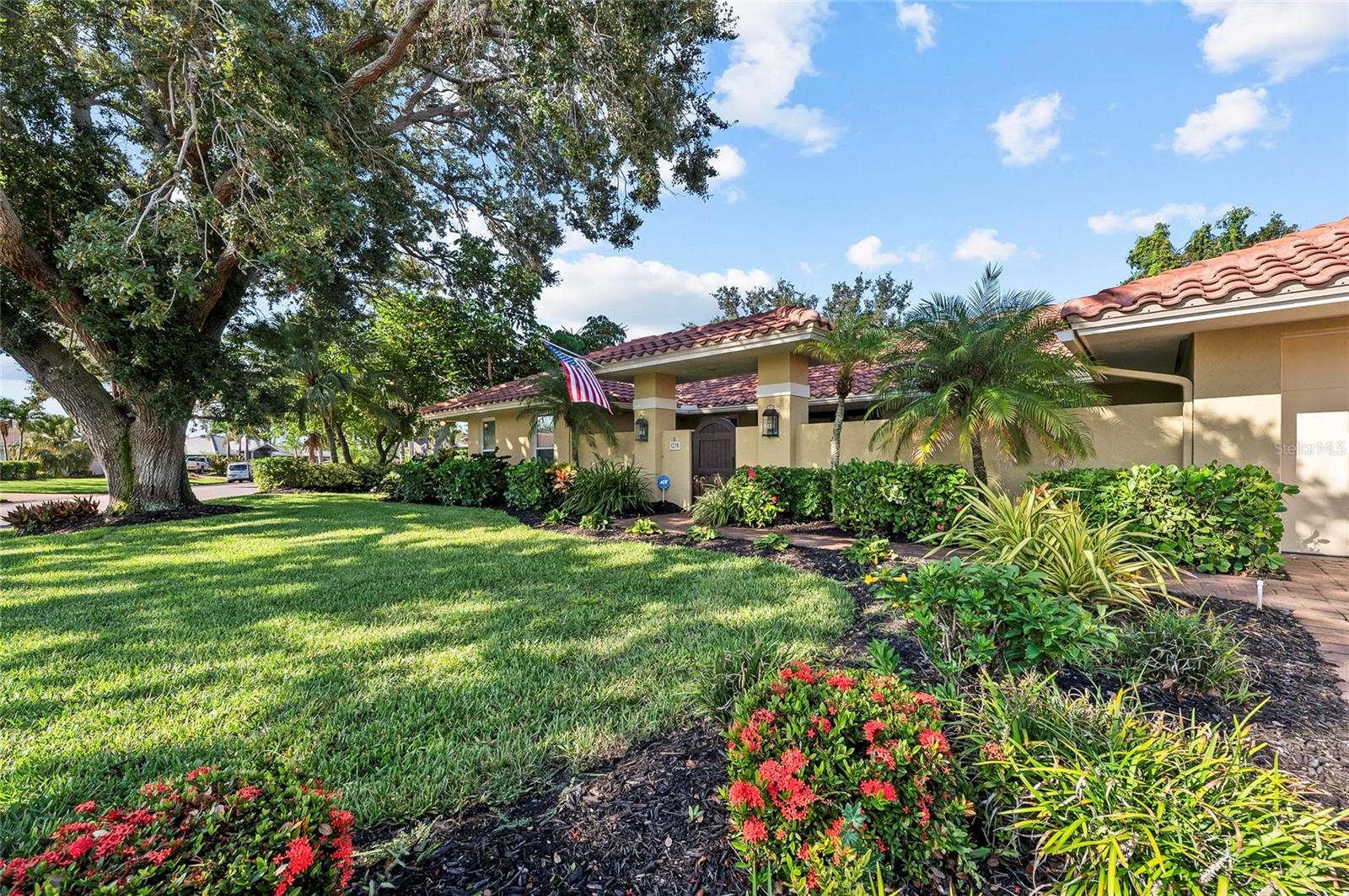 New listing alert in the highly sought-after community of Southbay Yacht & Racquet Club, where true resort-style living awaits. The community offers an impressive array of amenities, including a marina, a recently remodeled clubhouse, shuffleboard courts, three tennis courts, four pickleball courts, a bocce ball court, basketball courts, and kayak storage. Residents also enjoy a waterfront park and nearly 20 acres of common grounds with miles of walking trails. A true highlight is the gorgeous geothermal pool, which showcases stunning marina views and is a must-see when visiting Southbay! Now that you’ve fallen in love with the community, are you ready to explore this spectacular home that’s waiting to be yours? This spacious residence, spanning over 3,000 square feet, welcomes you with a brick-paver driveway and lush, mature landscaping along the front walkway. Continue through the gated entry to discover the tranquil sound of a well-maintained water feature before stepping inside. The interior boasts hard flooring throughout, soaring ceilings, and a layout designed for both everyday living and effortless entertaining. The floor plan includes two distinct family rooms, one with a cozy fireplace, wet bar, and beverage refrigerator, and the other offering beautiful views of the pool. The primary bedroom includes an additional room with pool views, ideal for an office or exercise space...the choice is yours. A spacious laundry room, complete with a double desk and abundant storage, adds to the home’s functionality. Outside, the large lanai features a beautiful pool and provides generous covered areas, and plenty of open space for sunbathing under the clear blue sky. Recent updates include a new roof installed in 2023 and a recently refinished and resurfaced pool. The location is equally appealing, just minutes from a variety of restaurants and shopping, convenient highway access, and the soft, powdery sands of Southwest Florida's Gulf Beaches. I welcome you to visit this home... come see, come sigh, and make it your own!