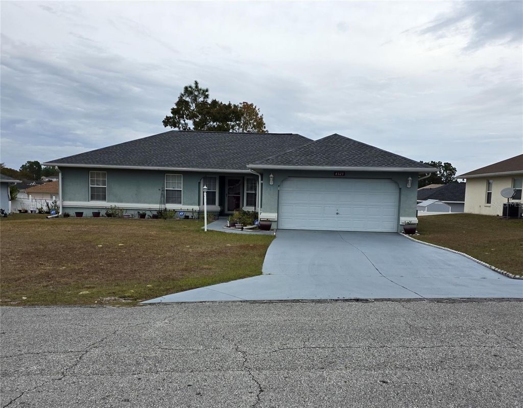 Photo of 8525 SW 136th Loop, Ocala, FL 34473 (MLS # OM714422)