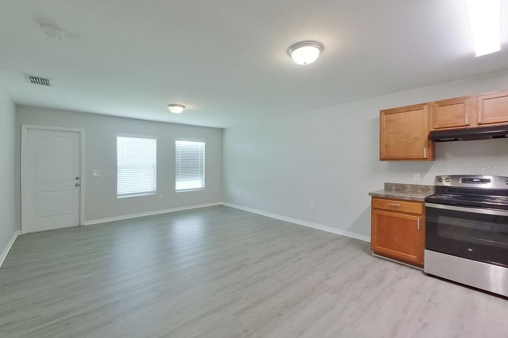 Photo of 3214 65th Street W, Lehigh Acres, FL 33971 (MLS # O6363856)