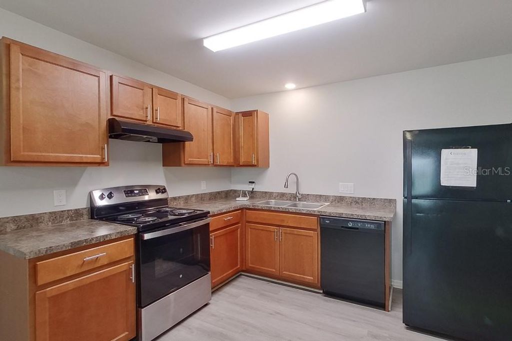 Photo of 3214 65th Street W, Lehigh Acres, FL 33971 (MLS # O6363856)