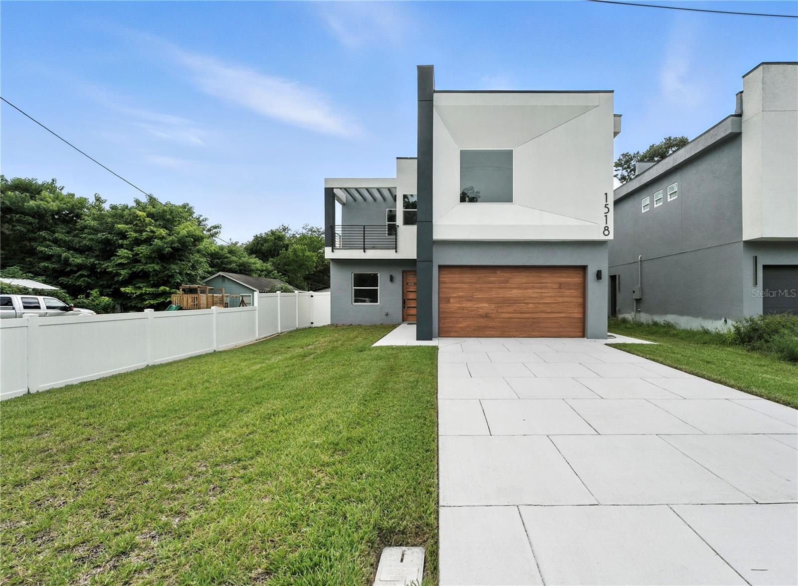 Welcome to 1518 Cloverlawn Avenue — a stunning, newly reimagined modern day home nestled in the vibrant Hourglass District of Orlando. This 5-bedroom, 4.5-bathroom property offers nearly 3,750 square feet of beautifully designed living space, including an attached 1-bedroom, 1-bathroom guest house/ADU, perfect for rental income, a home office, or extended family.
The main home features a spacious 4-bedroom, 3.5-bath layout, thoughtfully updated with modern finishes, an open-concept floor plan, high ceilings, and oversized windows that flood the space with natural light. The gourmet kitchen includes quartz countertops, sleek cabinetry, and a large island perfect for entertaining. A luxurious primary suite offers a spa-like ensuite bath and generous walk-in closet.
Outside, you'll find a fully fenced spacious yard, private patio, and professional landscaping—creating a serene backdrop for outdoor gatherings. The attached guest suite offers its own private entrance and approximately 1,000 square feet of stylish, self-contained living space with full kitchen, laundry, and private driveway access.
Situated on a quiet street with no HOA, this home is just minutes from Downtown Orlando entertainment, Lake Como, SODO, and top-rated schools including Lake Como K-8 and Boone High. Commuting is a breeze with easy access to I-4, 408, and Orlando Health.
Whether you're looking for a versatile investment property, space for multigenerational living, or a turnkey home with income potential, 1518 Cloverlawn Ave delivers unmatched flexibility and modern comfort.
