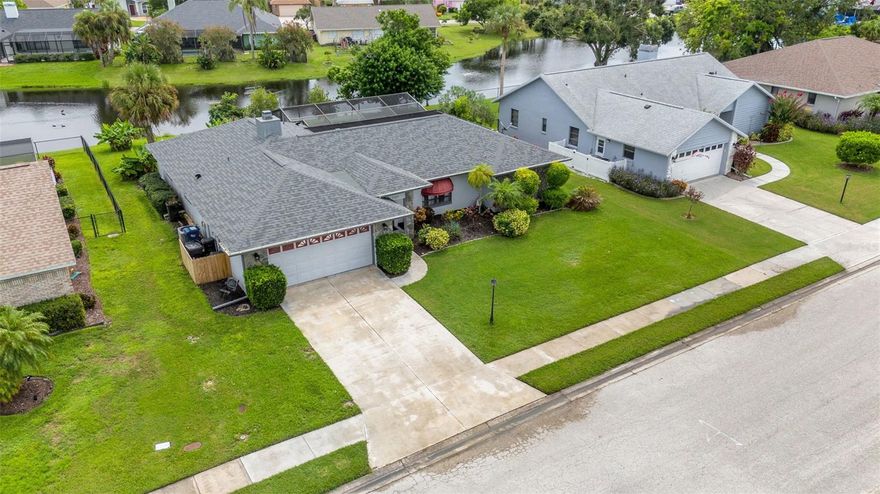 Welcome to your slice of paradise in the desirable Lionshead community of Bradenton! This spacious 3-bedroom, 2-bath home offers the perfect blend of comfort, style, and Florida living at its finest. Step inside to discover a spacious, light-filled interior with an inviting open floor plan designed for both relaxing and entertaining. The heart of the home features a galley kitchen that flows seamlessly into the living and dining areas, all overlooking your private backyard oasis. Enjoy year-round outdoor living with a sparkling screened-in pool and covered lanai, perfect for morning coffee or sunset gatherings. The serene pond view provides a peaceful backdrop and enhances the tranquil ambiance of this property. Additional highlights include: Brand-new roof (less than 1 year old), New Wate Heater, Split bedroom layout for added privacy, Wood burning fireplace, generously sized primary suite with en-suite bath.  Lionshead is a well-established neighborhood with low HOA fees, No CDD fees, located just minutes from shopping, dining, top-rated schools, and the beautiful Gulf beaches. Don’t miss your opportunity to own this move-in ready gem in one of Bradenton’s hidden treasures!