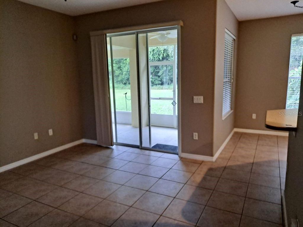 Photo of 13534 Biscayne Grove Lane, Grand Island, FL 32735 (MLS # TB8451478)