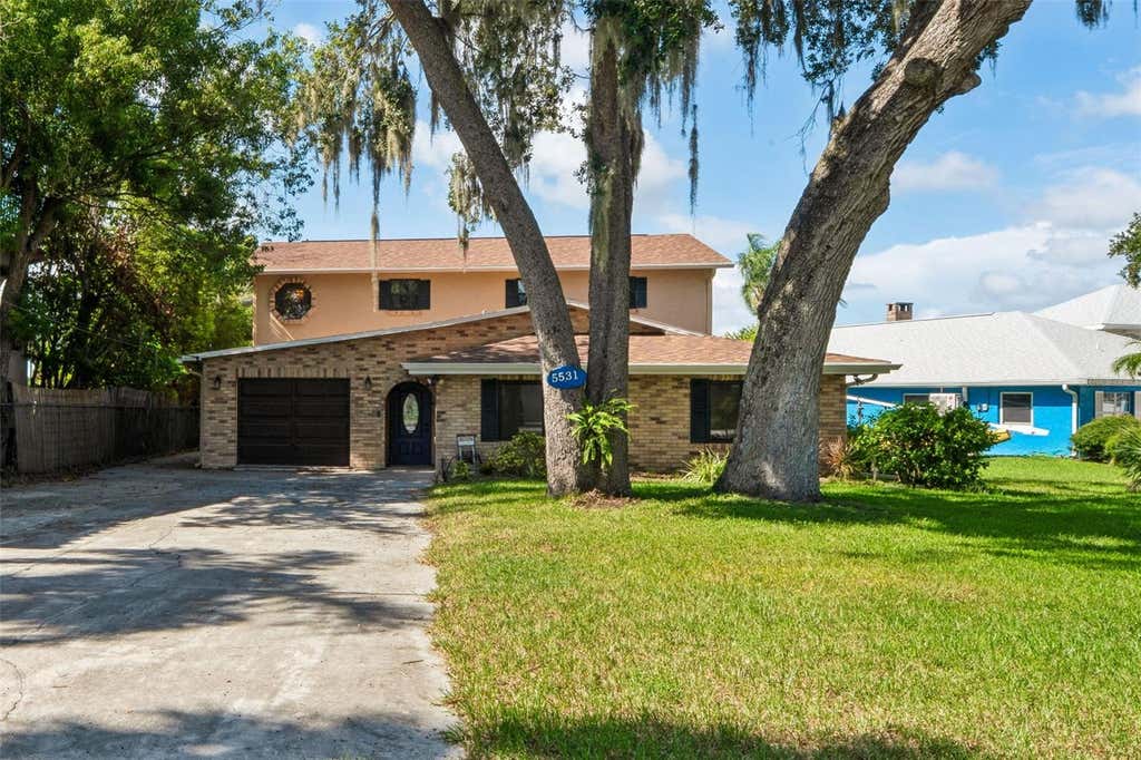 Photo of 5531 Manatee Point Drive, New Port Richey, FL 34652 (MLS # W7888443)