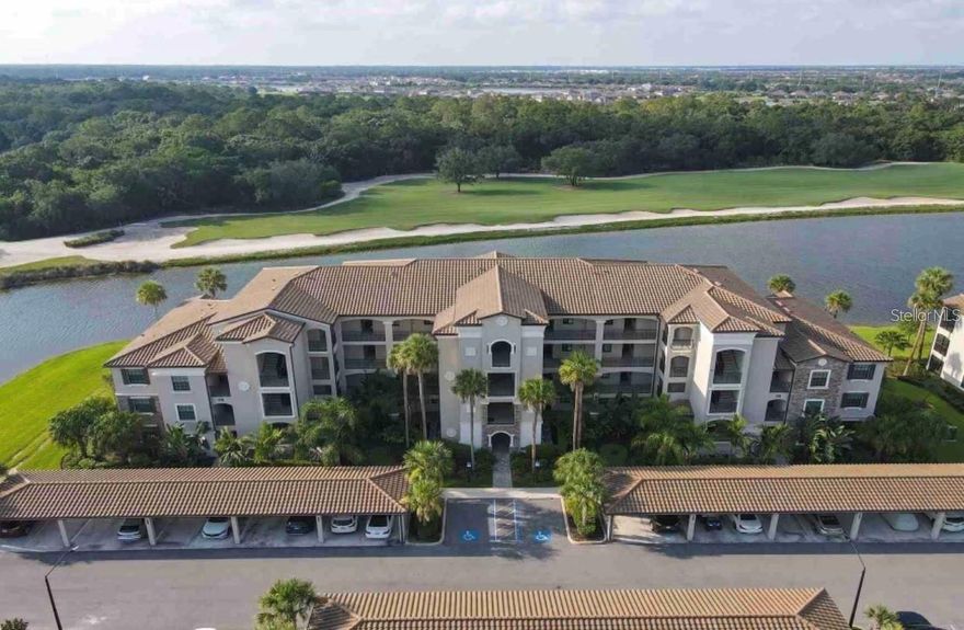 This beautiful coastal inspired 3rd floor condo in the heart of one of the most desirable golf communities in Florida. Spectacular views of the sunrise and sunsets, as well as water, golf course views. All furniture is included!!!! Beautiful outdoor screened in porch. This open concept floor plan is spacious, and the soothing blue color will allow you to relax. This home comes with one assigned covered parking space very close to the entrance and an additional storage area right across from the unit. Elevators make this home easily accessible. Lakewood National Golf Club offers gated, maintenance free living with extraordinary amenities that include 36 holes of Arnold Palmer designed golf courses. Resort style pools. Newly built grand clubhouse. Two dining restaurants with one being poolside. Eight tennis courts. Four pickleball courts. Two Har-tru bocce courts. Amazing fitness center open 24/7. Full service spa. Gated community with 24 hour security guards.