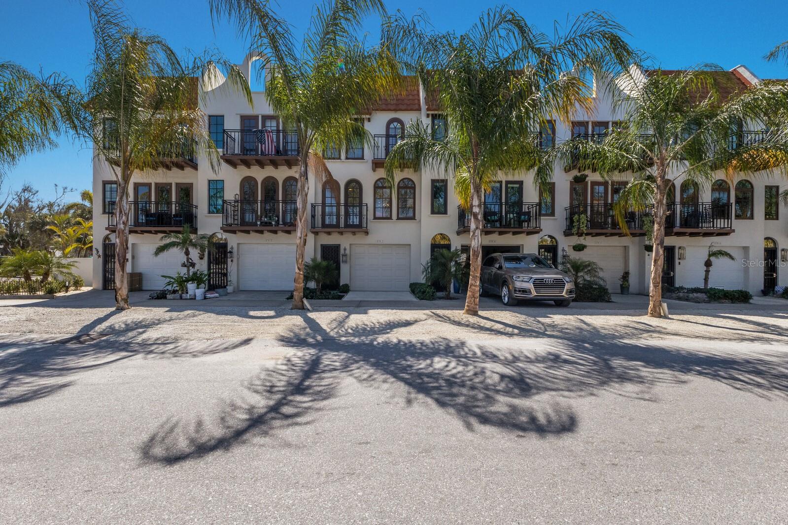 Nestled in the heart of Boca Grande’s cherished historic village, this rarely available residence in Park Place Colony provide the perfect blend of timeless charm and modern ease. Just a short stroll or golf cart ride to the Gasparilla Inn, Gulf beaches, tennis courts, shops, and award-winning dining, this home invites you to enjoy the relaxed sophistication that defines life on the island.
Thoughtfully constructed with solid concrete block and a commercial-grade flat roof, this residence is built for effortless ownership. Inside, natural light pours through custom Marvin windows and doors, while the Brazilian hardwood balconies offer peaceful views of the Gasparilla Inn and Tennis Club—a daily reminder that you’ve arrived somewhere truly special.
The ground floor features a generously sized garage and utility space (15’ x 40’)—ideal for storing bikes, golf carts, and all your coastal essentials. Upstairs, you’ll find an elegant open living space, two bedrooms with ensuite baths, and elevated finishes throughout.
Whether you’re seeking a refined seasonal retreat or a low-maintenance full-time home with NO HOA, Park Place Colony Unit 3 is a rare opportunity to live just steps from the Gulf, the Inn, and everything that makes Boca Grande village living so iconic.