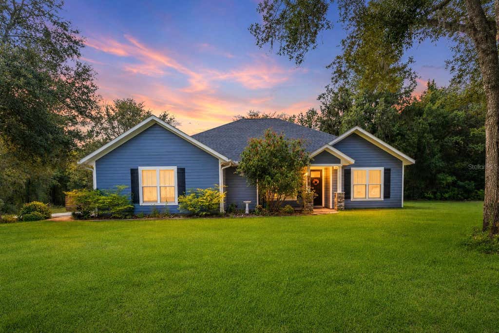 Photo of 8069 NE 8th Place, High Springs, FL 32643 (MLS # GC541997)