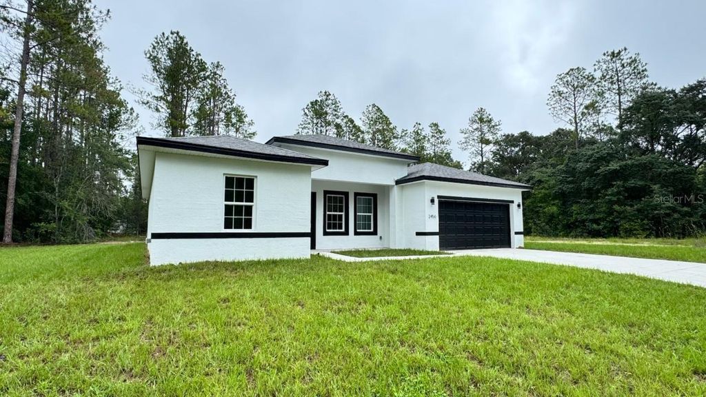 Photo of 2456 W Magenta Drive, Citrus Springs, FL 34434 (MLS # O6328173)