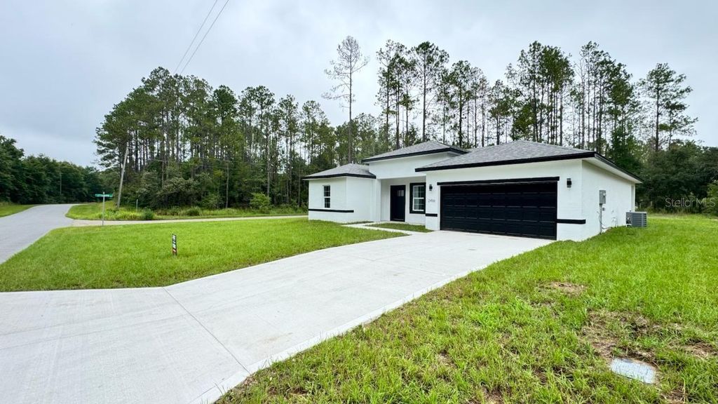 Photo of 2456 W Magenta Drive, Citrus Springs, FL 34434 (MLS # O6328173)