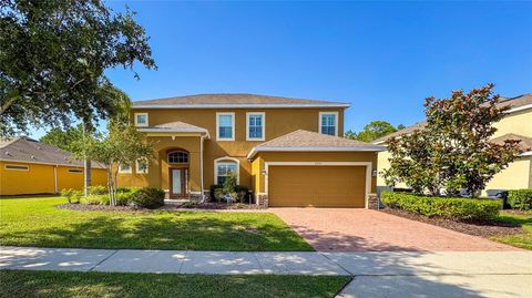 Photo of 206 Yellow Snapdragon Drive, Davenport, FL 33837 (MLS # O6322910)
