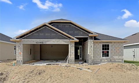 Photo of 1631 Ann Rose Way, Leesburg, FL 34748 (MLS # O6399883)