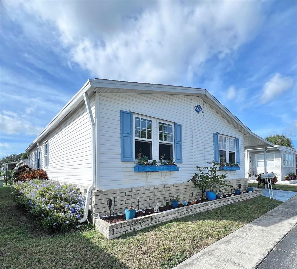 Photo of 51 Pindo Palm Street E, Largo, FL 33770 (MLS # TB8447327)