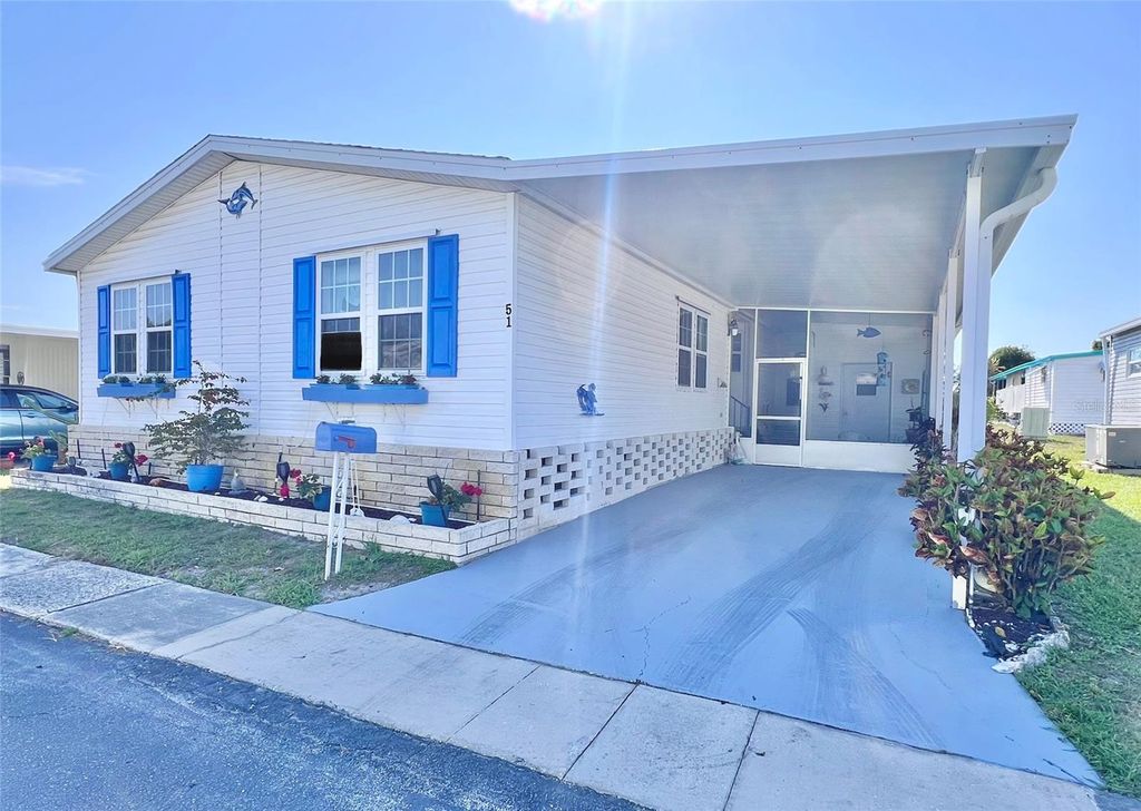 Photo of 51 Pindo Palm Street E, Largo, FL 33770 (MLS # TB8447327)