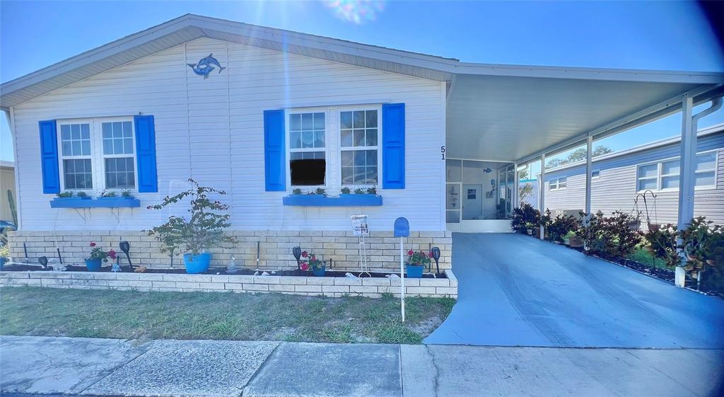 Photo of 51 Pindo Palm Street E, Largo, FL 33770 (MLS # TB8447327)