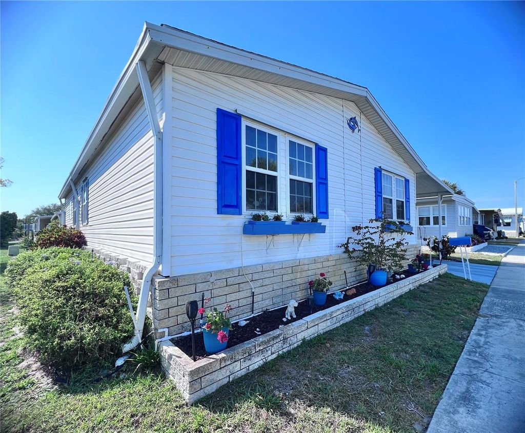 Photo of 51 Pindo Palm Street E, Largo, FL 33770 (MLS # TB8447327)