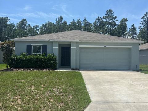 Photo of 308 Hickory Course Radial, Ocala, FL 34472 (MLS # OM725322)