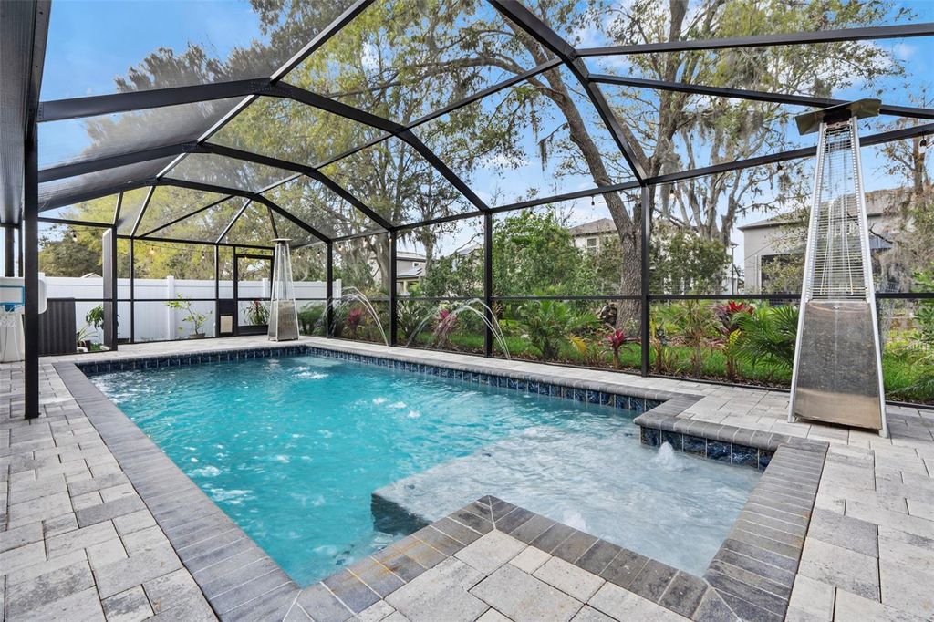 Photo of 31123 Stone Arch Avenue, Wesley Chapel, FL 33545 (MLS # TB8358013)