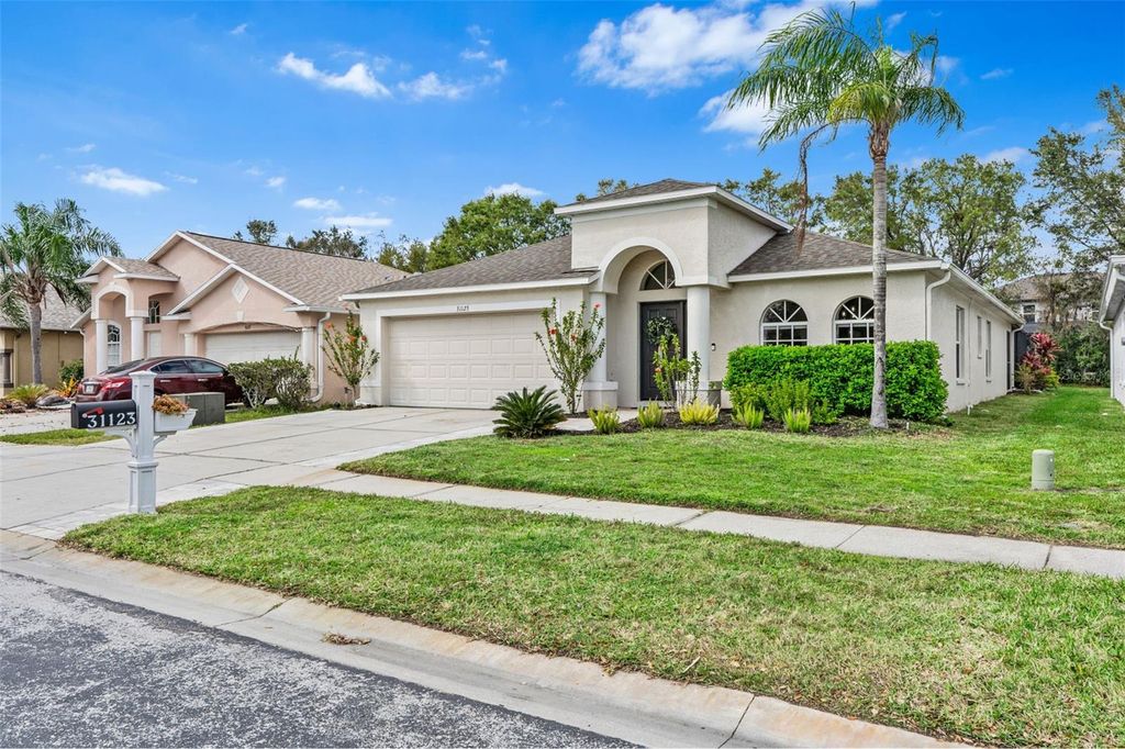 Photo of 31123 Stone Arch Avenue, Wesley Chapel, FL 33545 (MLS # TB8358013)