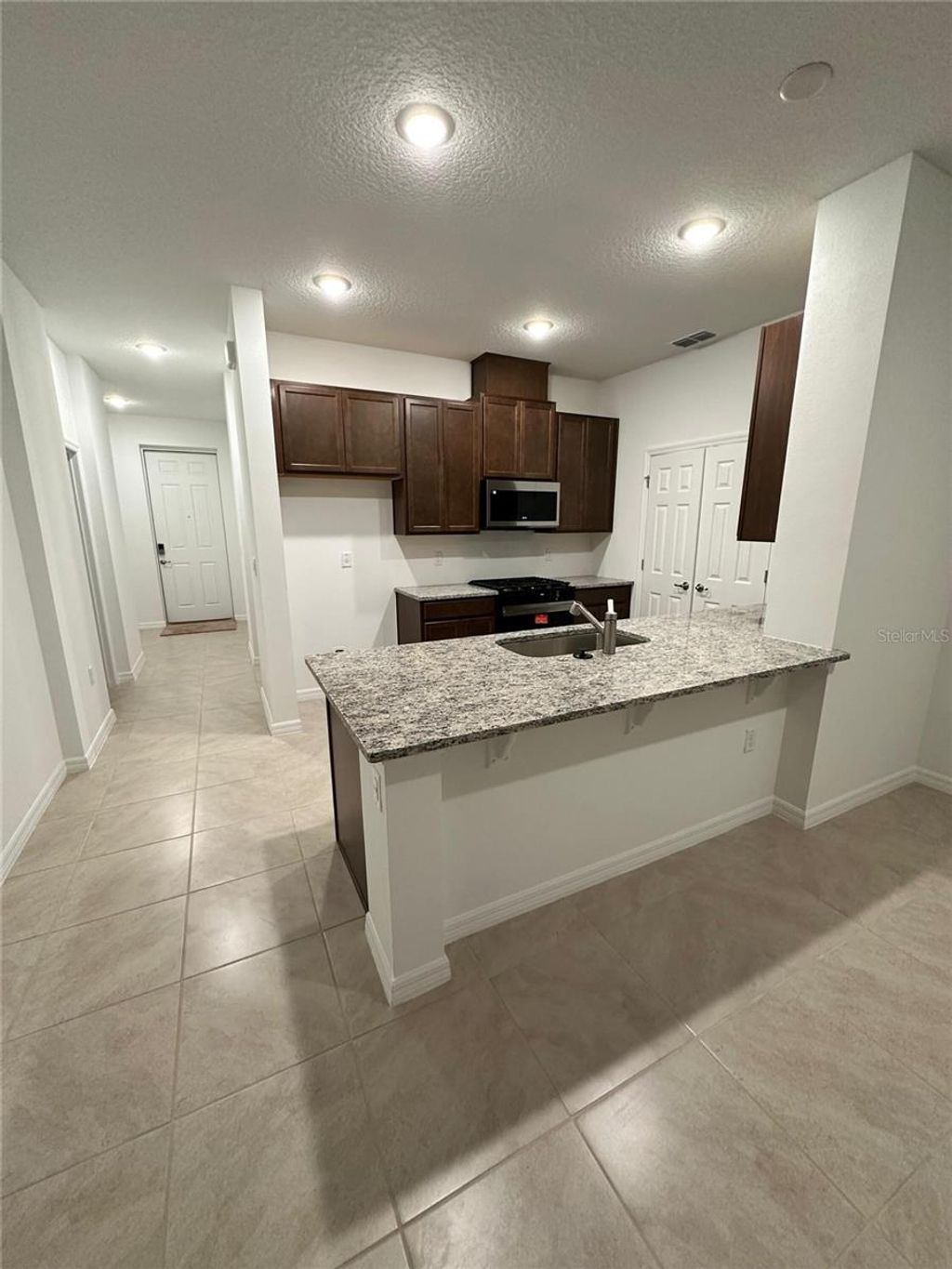 Photo of 7004 Broad Wing Loop, Howey In The Hills, FL 34737 (MLS # O6368222)