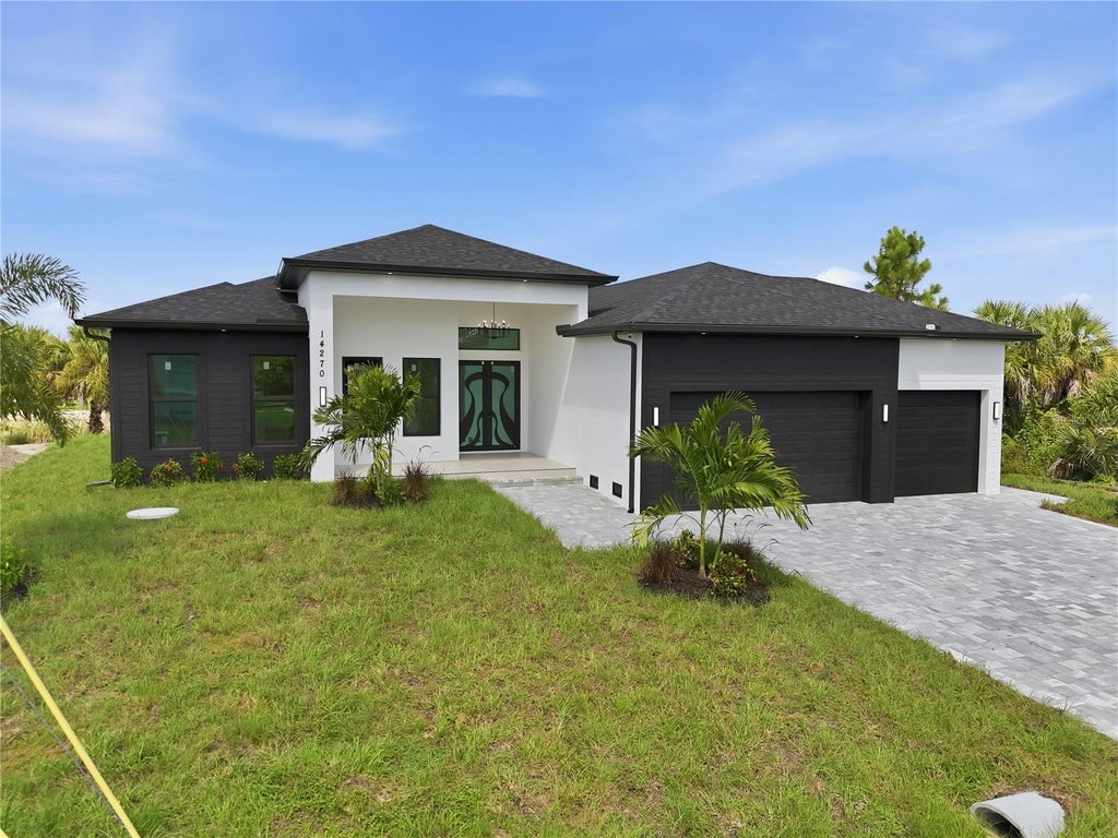 Photo of 14270 Fort Worth Circle, Port Charlotte, FL 33981 (MLS # O6438965)
