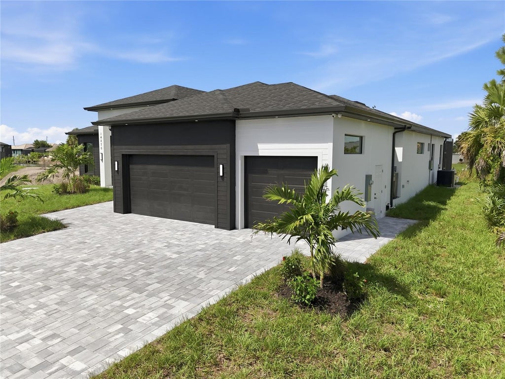 Photo of 14270 Fort Worth Circle, Port Charlotte, FL 33981 (MLS # O6438965)