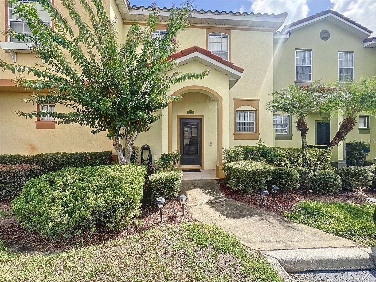 Welcome to 346 Monroe Cir, a charming 3-bedroom, 2.5-bath townhome available for rent in the gated community of Windwood Bay. This light-filled home features an open living and dining area, a well-equipped kitchen with all major appliances, and a sliding glass doors leading to a private screened porch with no rear neighbors, perfect for relaxing in privacy. Upstairs, the spacious primary suite is joined by two additional bedrooms, all with ample closet space. There are two assigned parking spaces located directly in front of the unit, clearly marked for your convenience. The community features a spacious swimming pool with plenty of seating, perfect for relaxing and enjoying the Florida sunshine. Ideally located just minutes from ChampionsGate, and a few miles from Disney and close to major attractions, this home is also near an array of restaurants, shopping centers, and medical facilities. Don’t miss this opportunity—schedule your showing today!