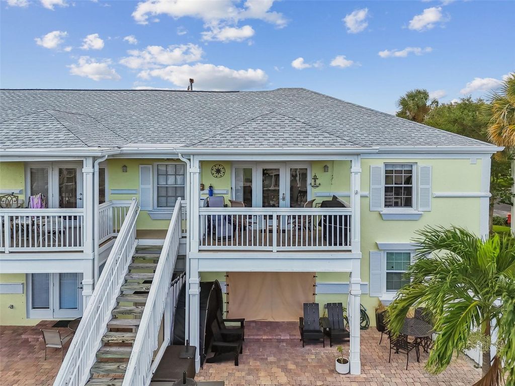 Photo of 5116 Beach Drive SE #D, St Petersburg, FL 33705 (MLS # TB8432483)