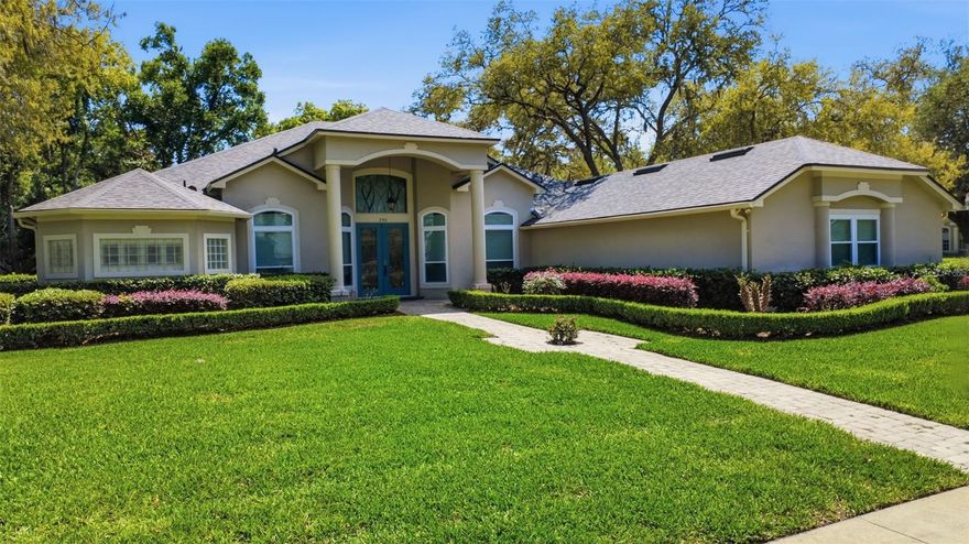 Executive-style living in the heart of Lake Mary. This beautifully upgraded home features an impressive list of major improvements including new windows, a whole-home re-pipe, remodeled kitchen and primary bathroom, newer roof, whole-home generator, and more. The kitchen is truly the heart of the home and a dream for both everyday living and entertaining, showcasing abundant quartz countertop space, a massive center island, 42” upper cabinetry, stainless steel appliances, and thoughtful design throughout. High ceilings, plantation shutters, and an abundance of natural light elevate the main living spaces. The split-bedroom floor plan offers privacy, with the primary suite and office on one side of the home and two additional bedrooms on the opposite side connected by a Jack-and-Jill bathroom. Multiple living areas—including a dedicated family room, living room, and dining space—provide exceptional flexibility and make hosting effortless. Step outside to the expansive screened-in lanai spanning over 1,100 square feet, overlooking a beautifully landscaped backyard and tranquil pond views. There is ample space to add a pool in the future, with a conveniently located full guest bath ideal for pool access. Completing the home is a spacious driveway and side-entry three-car garage offering nearly 750 square feet. Homes in Eagles Crossing rarely come to market, and this prime Lake Mary location offers low annual HOA fees while being just minutes from Lake Mary High School, downtown Lake Mary, dining, shopping, and more. Call today to schedule your private tour!