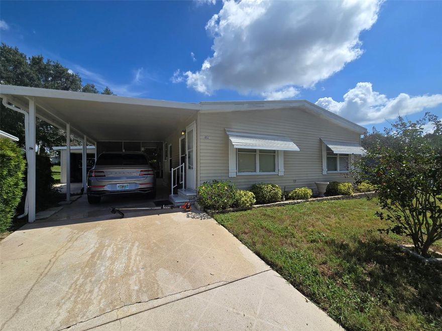 55+ gated golf course community   "PRICE REDUCED  SOLD AS IS,  ALL REASONABLE OFFERS WILL BE CONSIDERED 2 bedroom 2 bath quality built Palm Harbor home located on a greenbelt lot in the desirable pet area. It comes fully furnished and even includes a golf cart  New insulated membrane roof is only 6 years old. Lots of high quality laminate throughout  This home is move in ready and an ideal second home away from the freezing cold up north.  Don't delay this home will not last long. Zellwood Station is located approximately 25 miles north of Orlando just a short distance from the entrance ramp to the 429 western expressway, which allows for easy access to downtown Orlando, the international airport, and  all the area attractions. There are grocery, medical facilities and many churches nearby. Free from the traffic of Orlando but easily accessible to everything a big city offers.