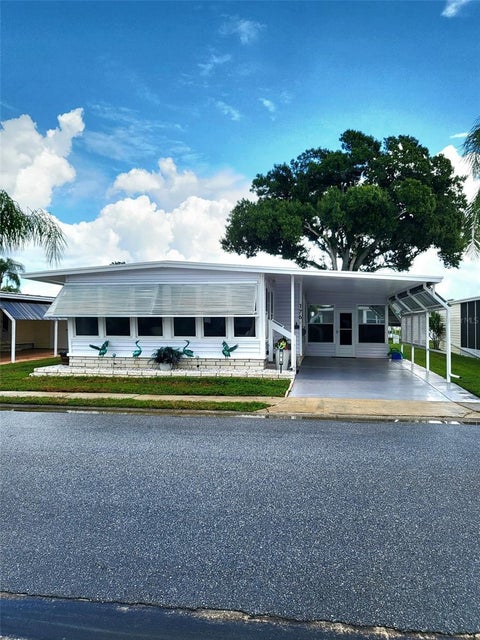 Photo of 1100 Belcher Road S #176, Largo, FL 33771 (MLS # TB8550713)