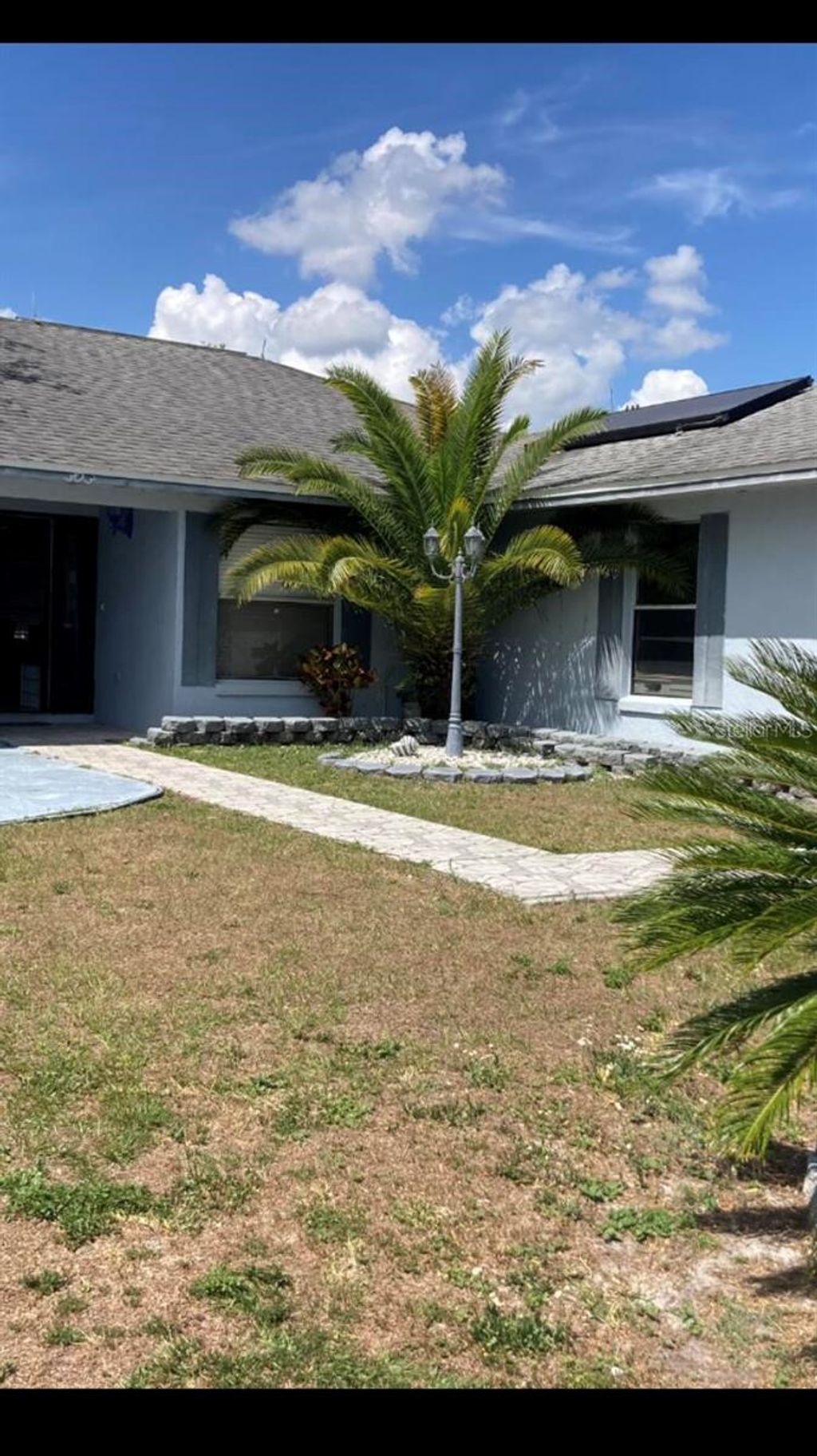 Photo of 303 Cocoa Court, Kissimmee, FL 34758 (MLS # O6334581)