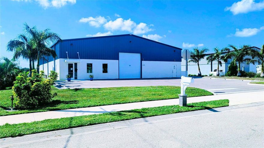 Investor Alert! Exceptional opportunity with $192,000 NOI secured by a 10-year NNN lease at $16,000/month. Lease includes 5% rent escalations every 3 years and a 5% property management fee added to the base rent. This state-of-the-art 7,597 SF industrial facility, built in 2021, sits on a 0.5-acre waterfront lot in a modern industrial park just off US 301 and Whitfield Ave—only 10 minutes from SRQ Airport.

Designed for high-performance operations, the property features three professional offices, a second restroom, 400-amp 3-phase power, dense high-amperage ceiling drops, high-output LED lighting, premium compressed air lines, 300-gallon water treatment system, 3,000 PSI commercial-grade flooring, acoustic ceilings, and a fully integrated security system. Climate-controlled with three 7.5-ton A/C units.

Beautifully landscaped with Royal, Foxtail, and Areca palms, the rear overhead door opens to a serene lake view. All furniture and fixtures included. Every aspect of this facility has been meticulously maintained with $831,200 in upgrades by the owner, ensuring a turnkey, maintenance free opportunity for investors seeking passive income with long-term security.
