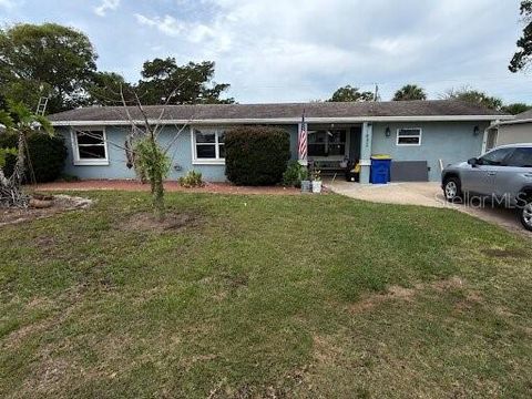 Photo of 1842 India Palm Drive, Edgewater, FL 32141 (MLS # TB8507979)