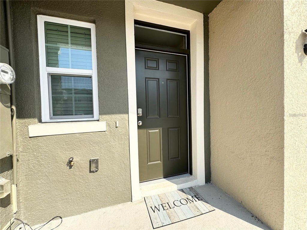Photo of 2353 Penguin Boulevard, Davenport, FL 33837 (MLS # O6447034)