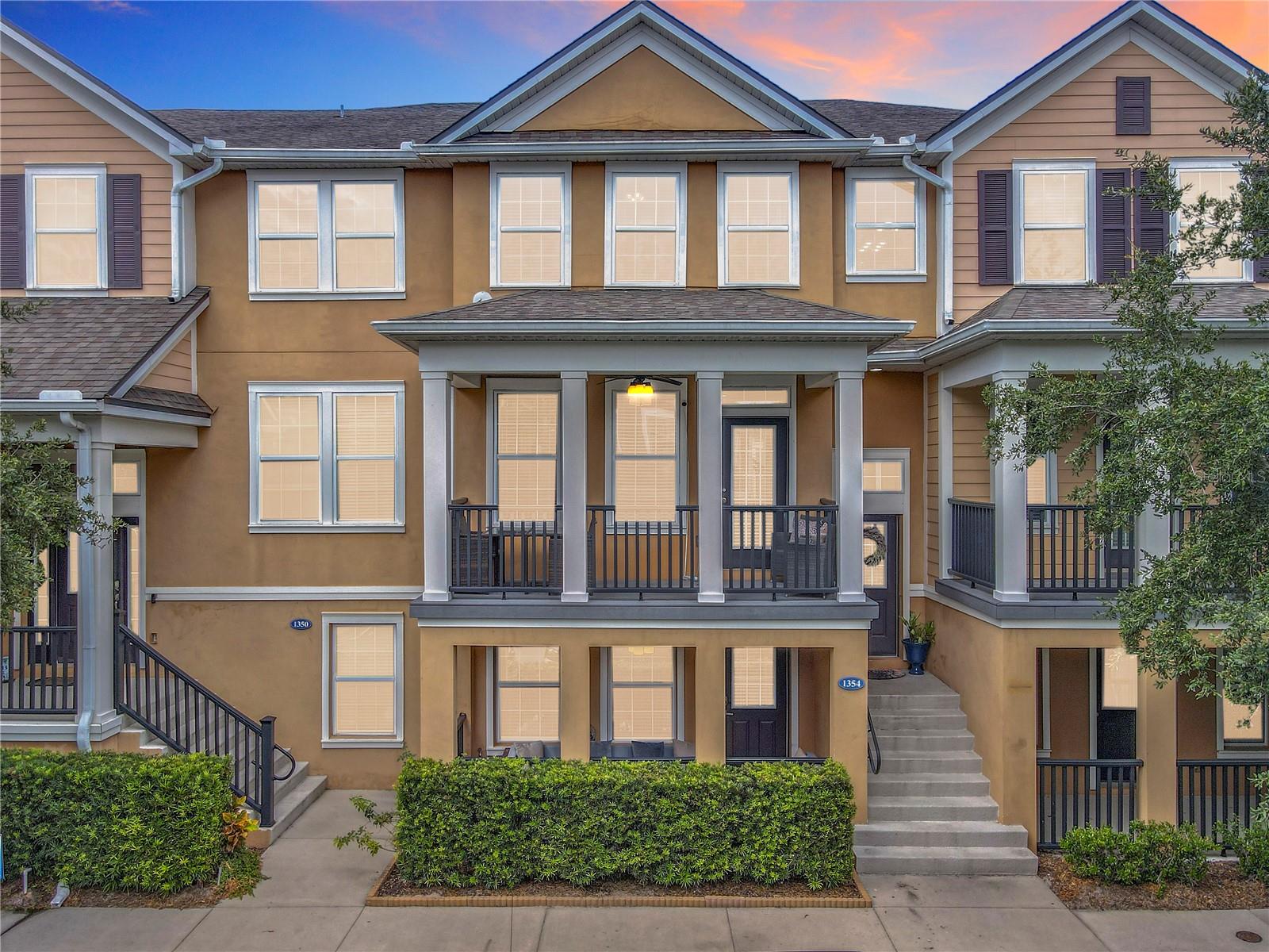 Welcome to your beautiful new home in the heart of Winter Springs! This spacious and low-maintenance townhome in the highly desirable Jesup’s Landing community is 100% move-in ready and filled with modern updates and smart features. This three-story home offers 3 bedrooms, 3.5 bathrooms, and plenty of space to spread out. On the ground level, you’ve got a roomy two-car garage with overhead storage, a big closet for extras, and a private bedroom suite—perfect for guests, in-laws, or even a home office. It comes complete with a walk-in closet, a beautifully updated bathroom, and its own private balcony. Head upstairs to the second floor, and you’ll find a bright, open space made for entertainment. The kitchen, dining, and living areas all flow together, with tile floors, a walk-in pantry, and tons of natural light. Step outside onto your second balcony to enjoy some fresh air and Florida sunshine! The kitchen features modern touches like a smart double convection oven you can control with your phone, a smart touch faucet, and a smart thermostat to keep the temps just right.
Up on the third floor, there are two more spacious bedrooms—including the master suite. The laundry room is up there, too (so convenient!) and has extra cabinets for storage. One bedroom has its own updated bathroom and walk-in closet, while the master has a large bathroom with dual sinks, a soaking tub, and a separate walk-in shower, plus another big closet. The community itself is amazing—featuring a pool, fitness center, clubhouse, and direct access to the popular Seminole Trail for walks, runs, or bike rides. You’re also just minutes from great restaurants, grocery stores, and everything you need in Winter Springs. This townhome checks all the boxes—don’t wait to make it yours because it’s not going to last long!