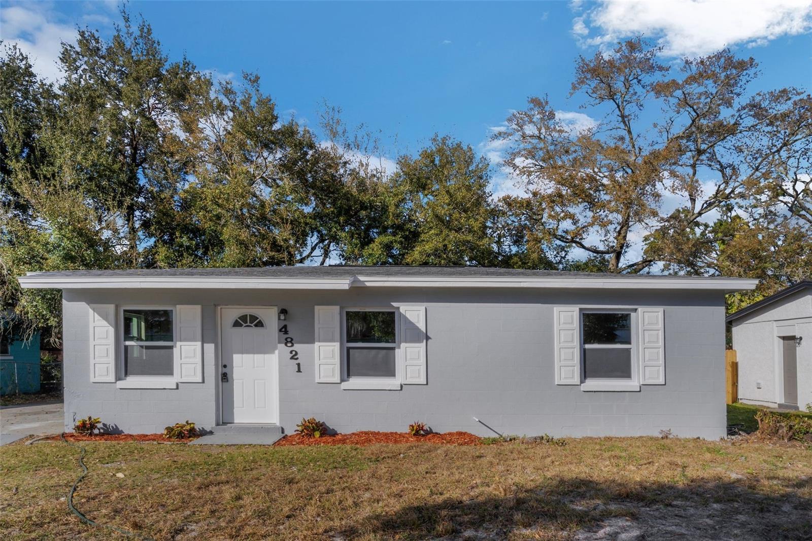 Fully remodeled 3 bedroom/1 bathroom home in Tangelo Park- only 10 minute drive to famous Universal Studios! This home features NEW interior and exterior paint, NEW luxurious vinyl flooring throughout, all NEW fixtures. NEW KITCHEN- with NEW cabinets, quartz countertops, backsplash and all NEW stainless-steel appliances. NEWly renovated bathroom with new toilet, vanity and retiled shower! TURN KEY home in a highly desired neighborhood. Backyard is fenced in with a chain-link fence. NEW 2023 ROOF, NEW 2023 central HVAC! Electrical panel updated in 2020